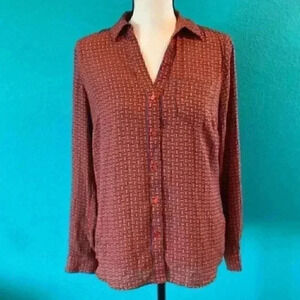 The limited Ashton orange shirt in size small